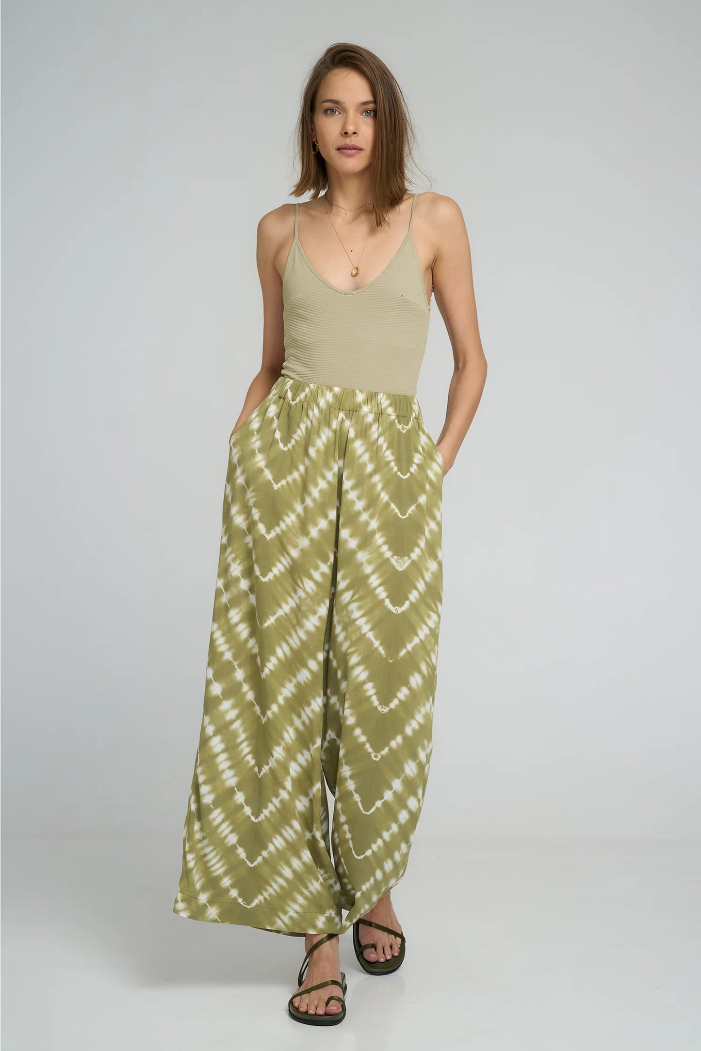 The Flynn Pant in Celestial Tie Dye Matcha Green is by Lilya