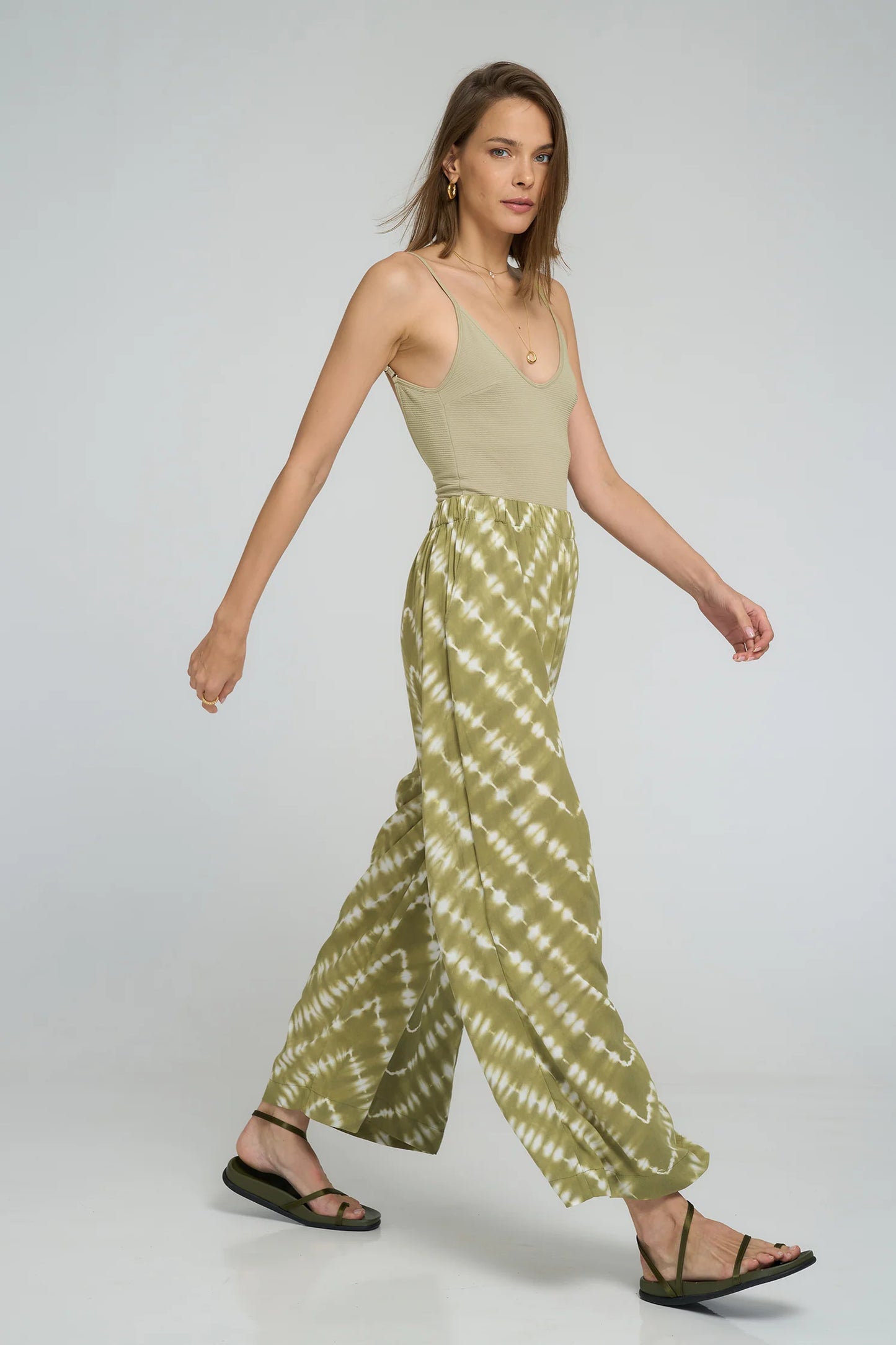 The Flynn Pant in Celestial Tie Dye Matcha Green is by Lilya